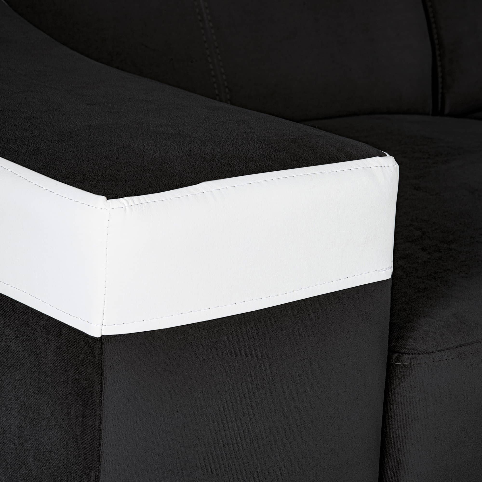 Canapé d’angle convertible réversible en tissu noir et simili blanc