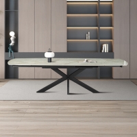 Table &agrave; manger extensible en pierre fritt&eacute;e beige et m&eacute;tal noir