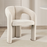 Fauteuil en tissu bouclette beige