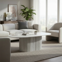 Table basse ovale en c&eacute;ramique beige 120 cm