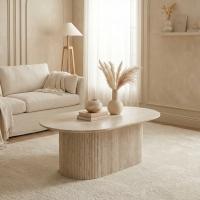 Table basse ovale en c&eacute;ramique beige 120 cm